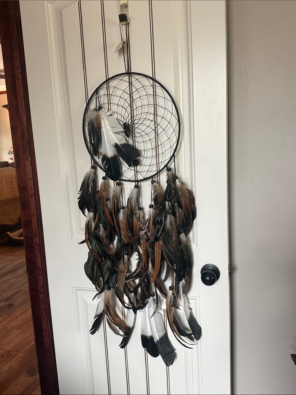 Large Feather Dreamcatcher in Black, Brown, White 14”x40”. Excellent Condition.